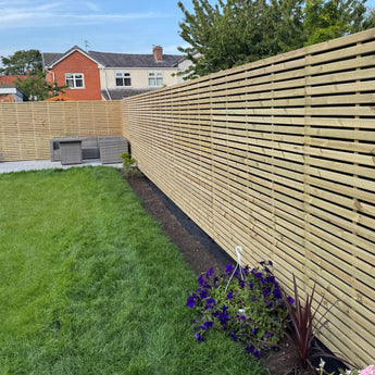 1.8m (6ft) slatted panels around whole garden