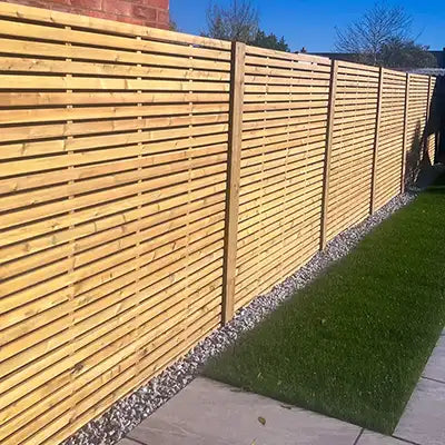 A Contemporary wooden garden slatted fencing
