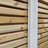 Slatted fence panels connected with concrete posts